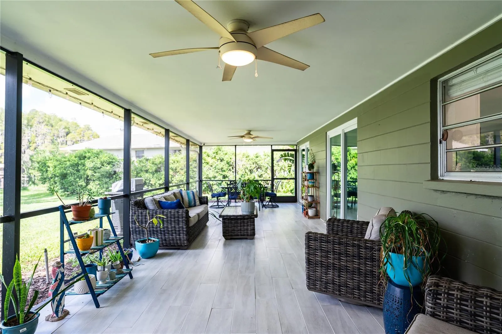 Covered lanai with fans to extend your entertaining space!