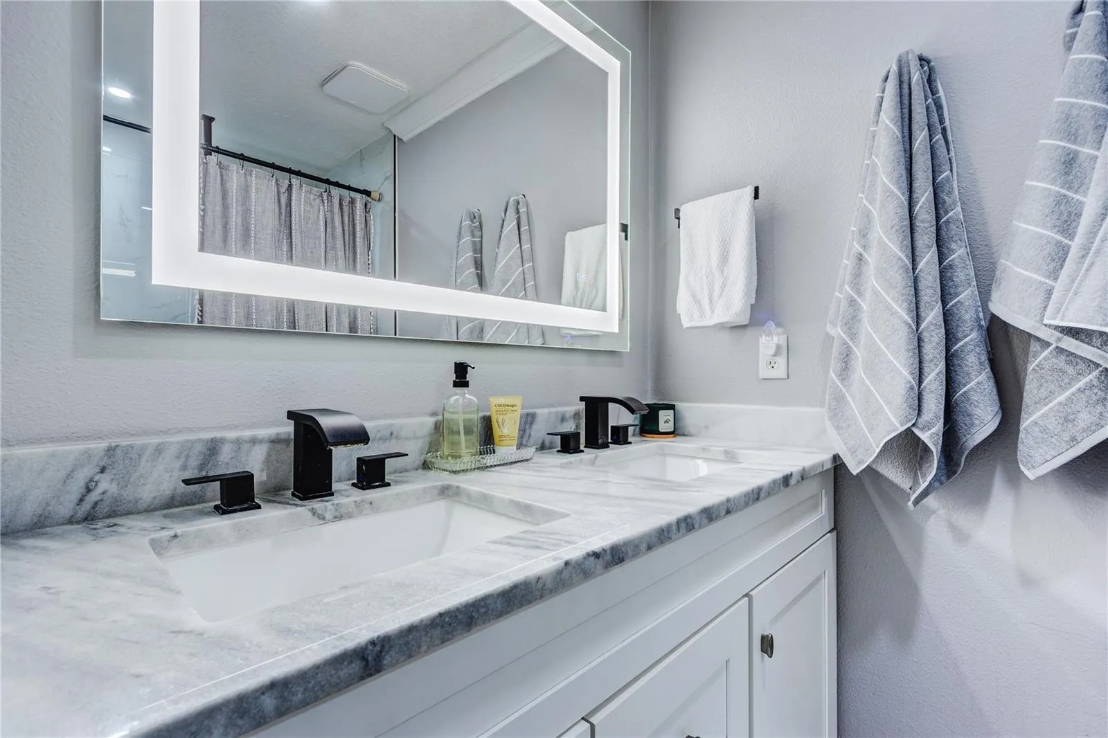 New bathrooms with multi functional lighted mirror