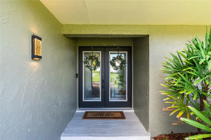 Leaded glass double door entrance welcomes you!