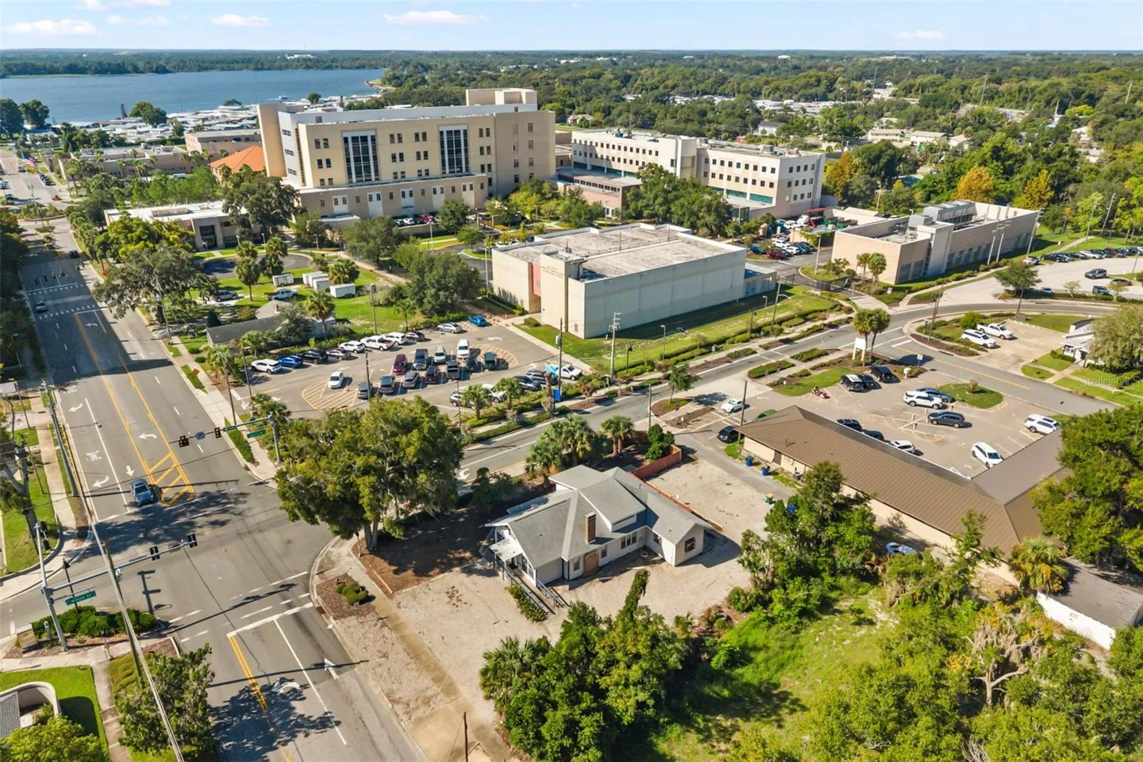Downtown Tavares, office building front center, courthouse and Lake Dora in view