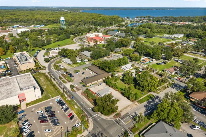Downtown Tavares, office building in front/center (corner lot), Lake Eustis in view