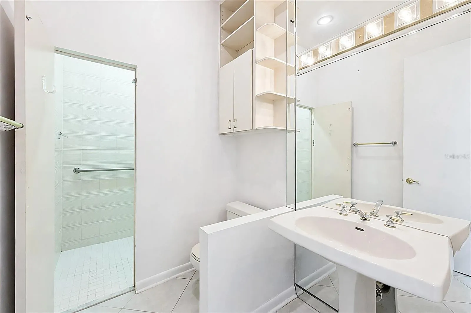 Main floor guest bathroom with hidden shower