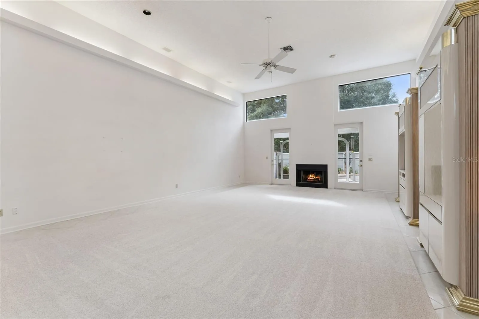 Living and dining room with wood burning fire place