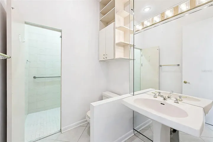 Main floor guest bathroom with hidden shower