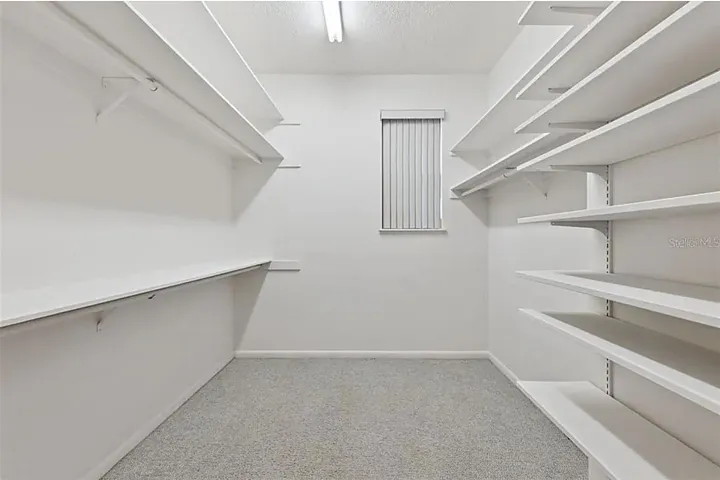 Walk in closet in upstairs 2nd primary suite