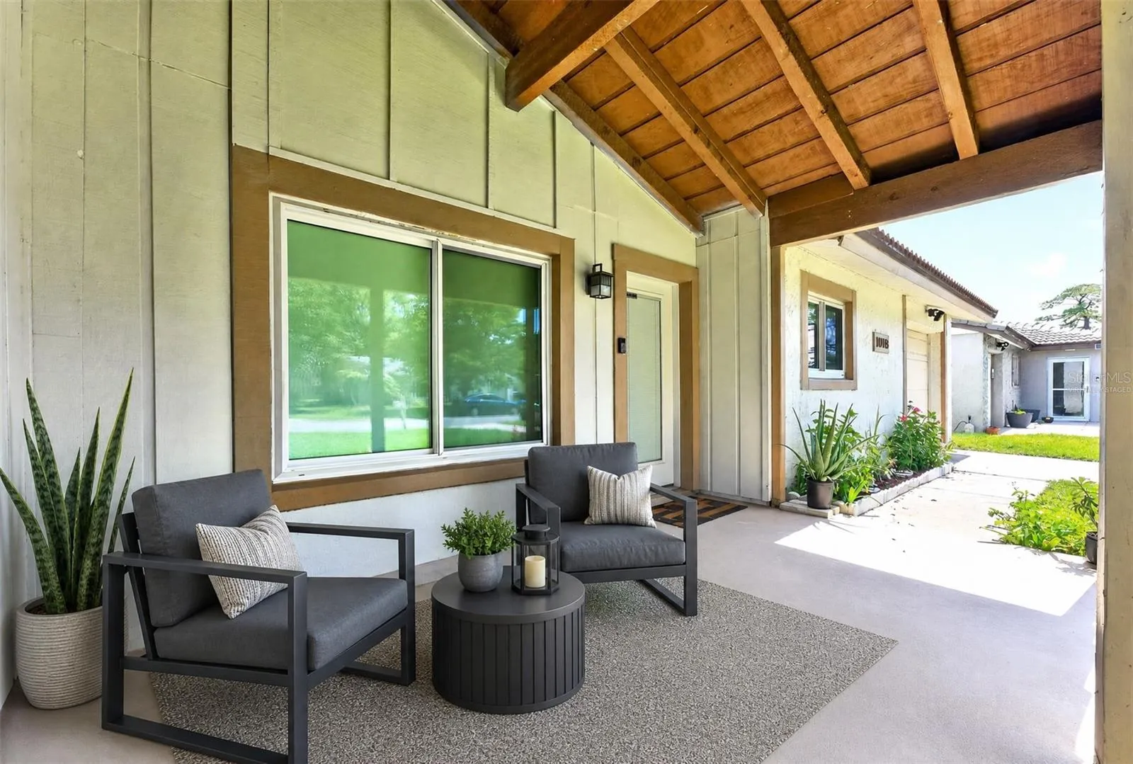 **WELCOME HOME** Front porch virtually staged.