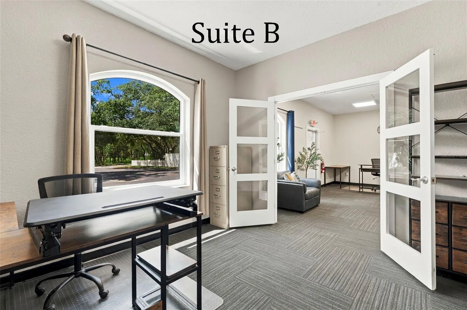 Double Glass Doors into Suite B, with Private Full Bathroom, Window to the Front of the Office, located by the Lobby