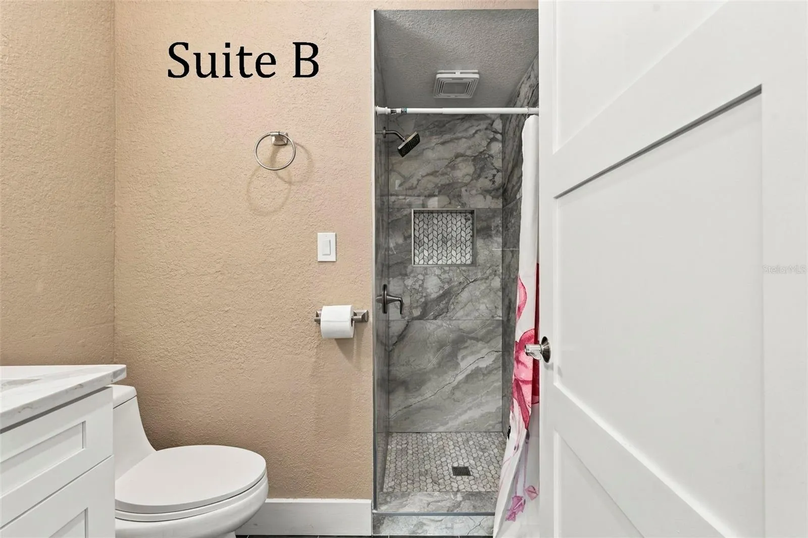Double Glass Doors into Suite B, with Private Full Bathroom, Window to the Front of the Office, located by the Lobby