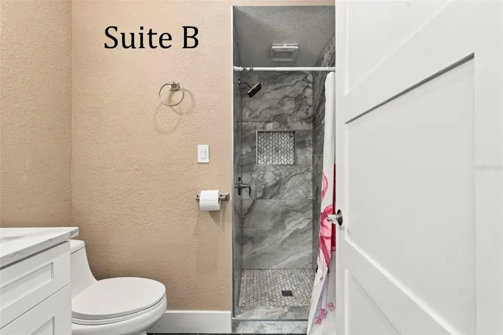 Double Glass Doors into Suite B, with Private Full Bathroom, Window to the Front of the Office, located by the Lobby