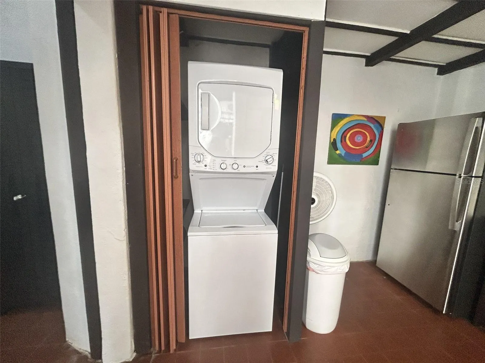 Laundry closet in the kitchen with washer/dryer combo Laundry closet in the kitchen with washer/dryer combo