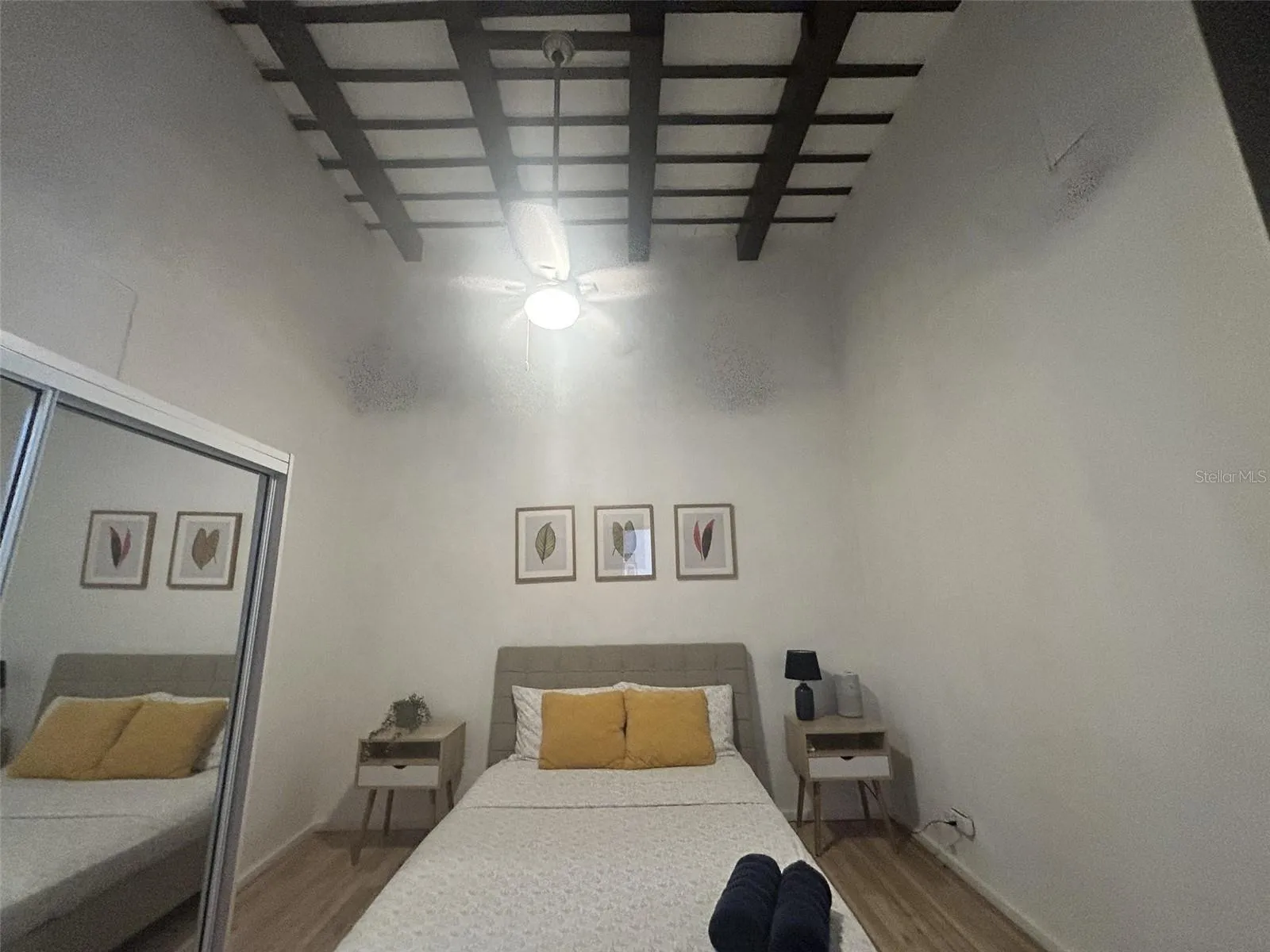 Bedroom, wood-beam ceiling and ceiling fan Bedroom, wood-beam ceiling and ceiling fan
