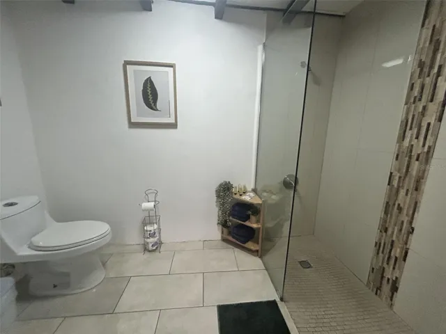 Remodeled full bathroom with walk-in shower