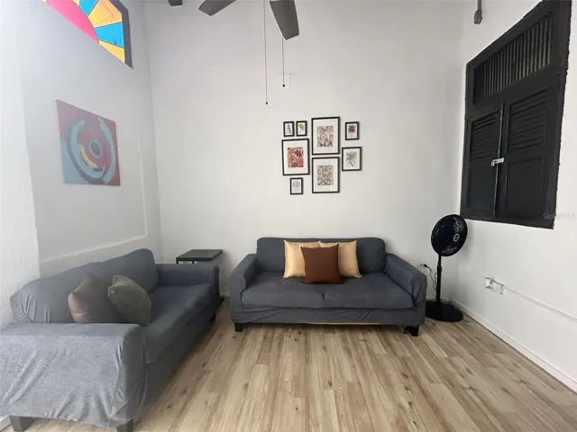 Living room with wood-beam ceiling