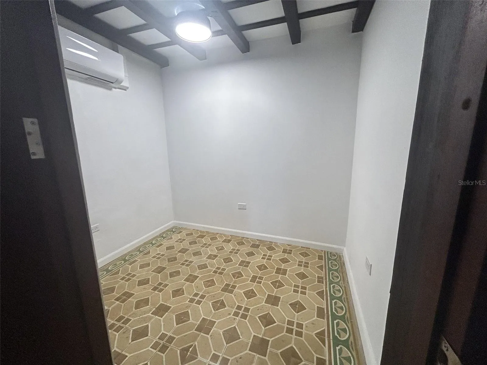Bedroom 3, main level, facing the entry, split A/C