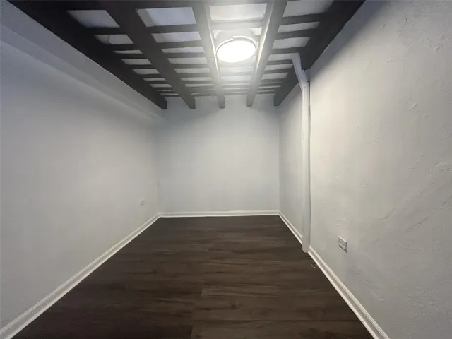 Bedroom 2, upper level, above bedroom 3, own spiral stairs, wood floor