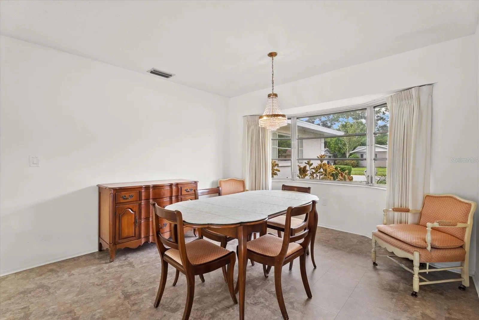 Dining room with bay window.
