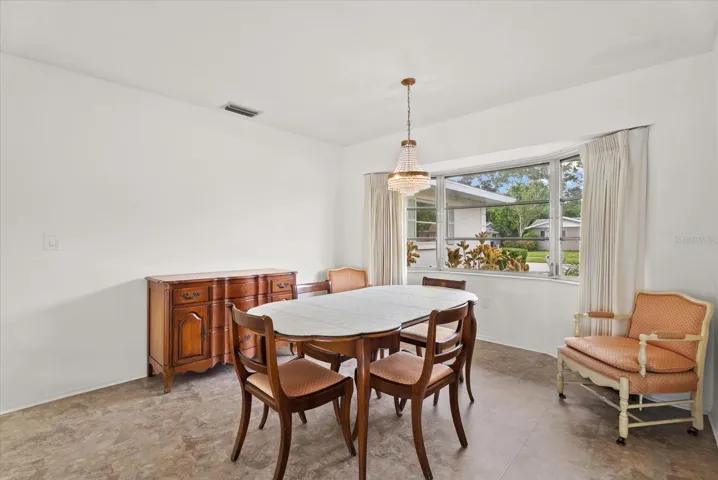 Dining room with bay window.