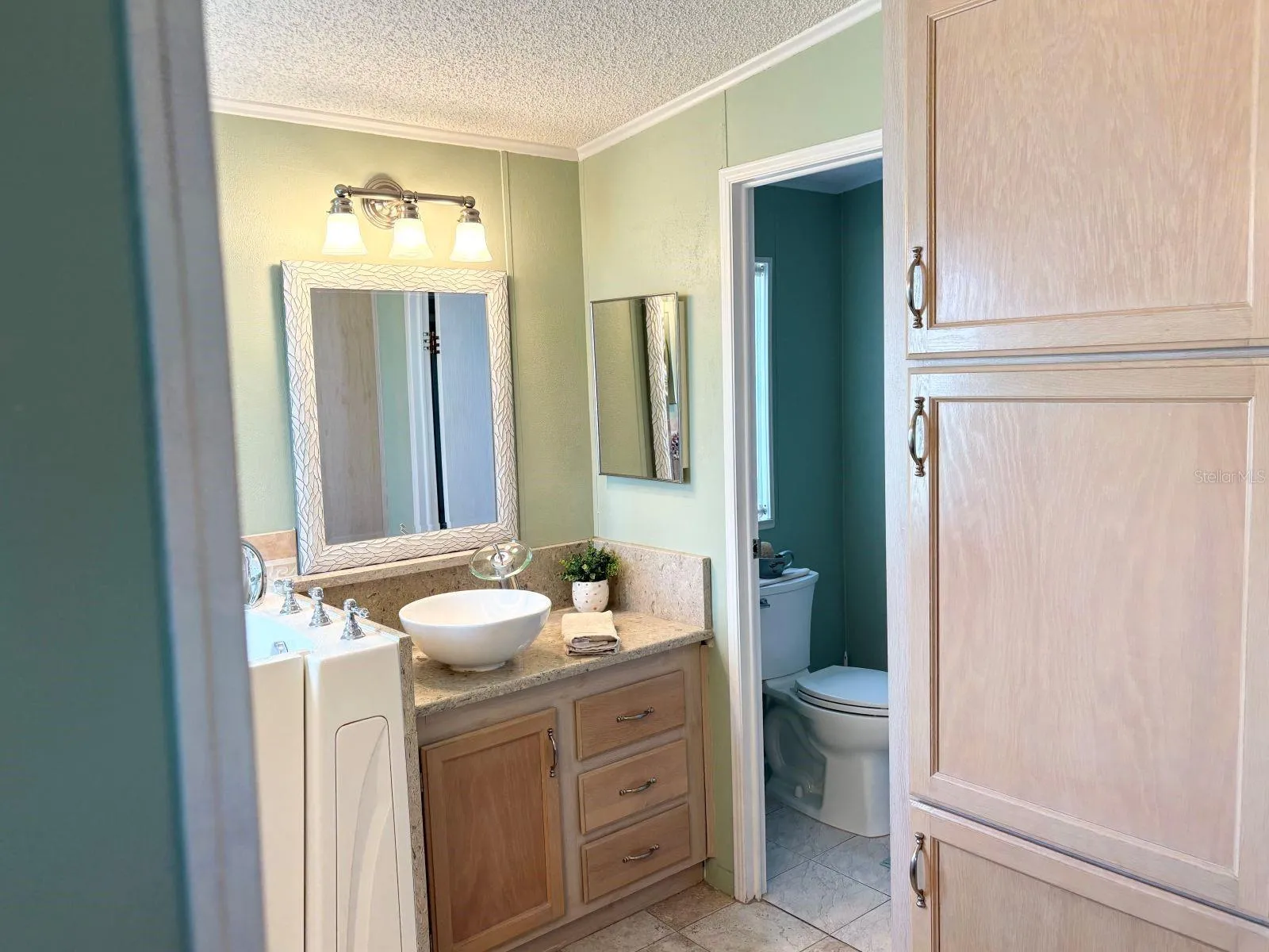 En-suite with water room and shower