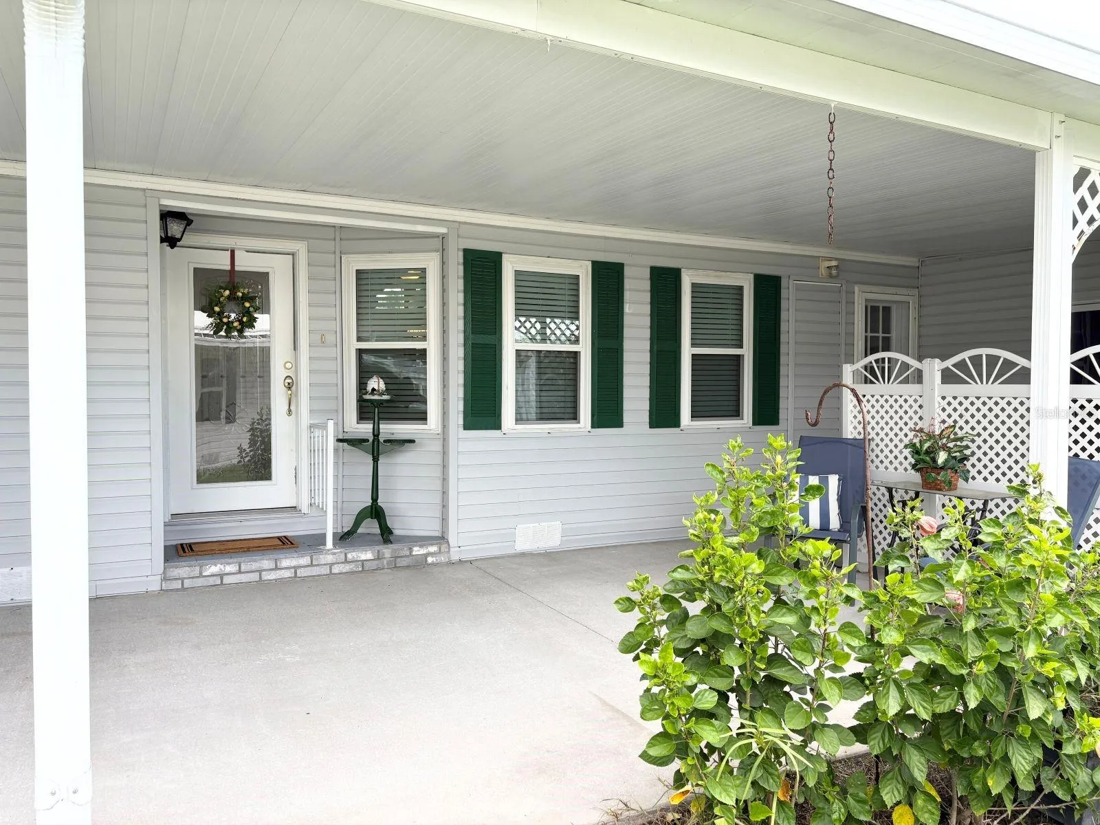 Carport with home entrance