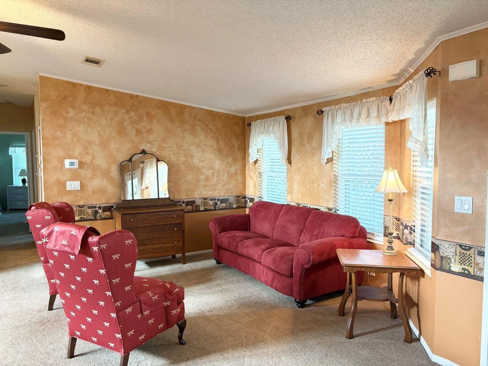 Living room with hall to bedrooms and guest bath