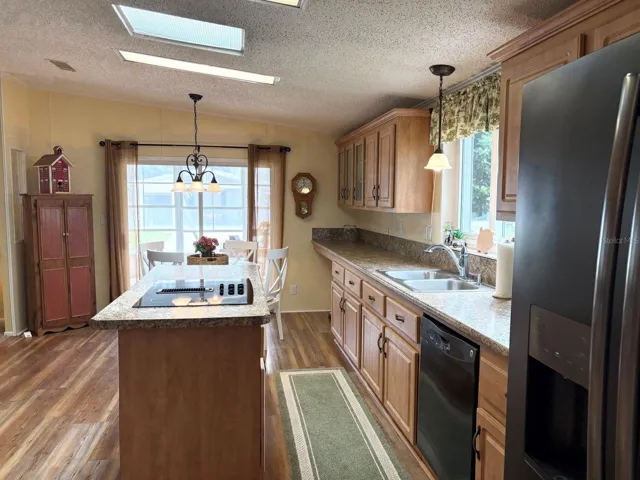 Kitchen with slider to enclosed porch