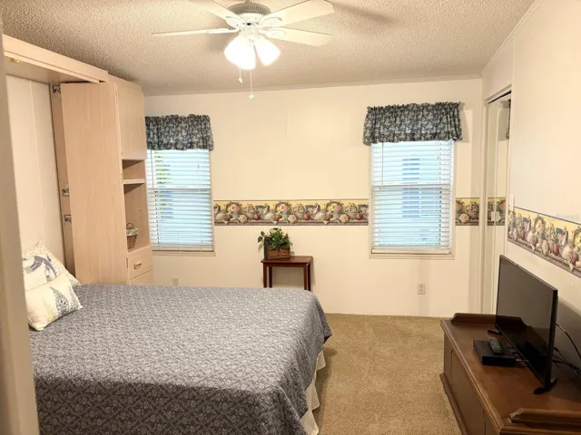 Bedroom 2 with Murphy bed and walk-in closet