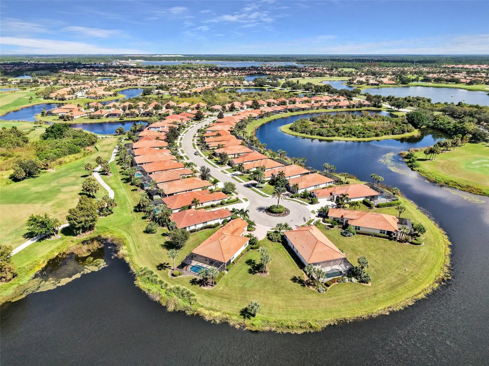 Aerial view showcasing the pool and golf course setting.