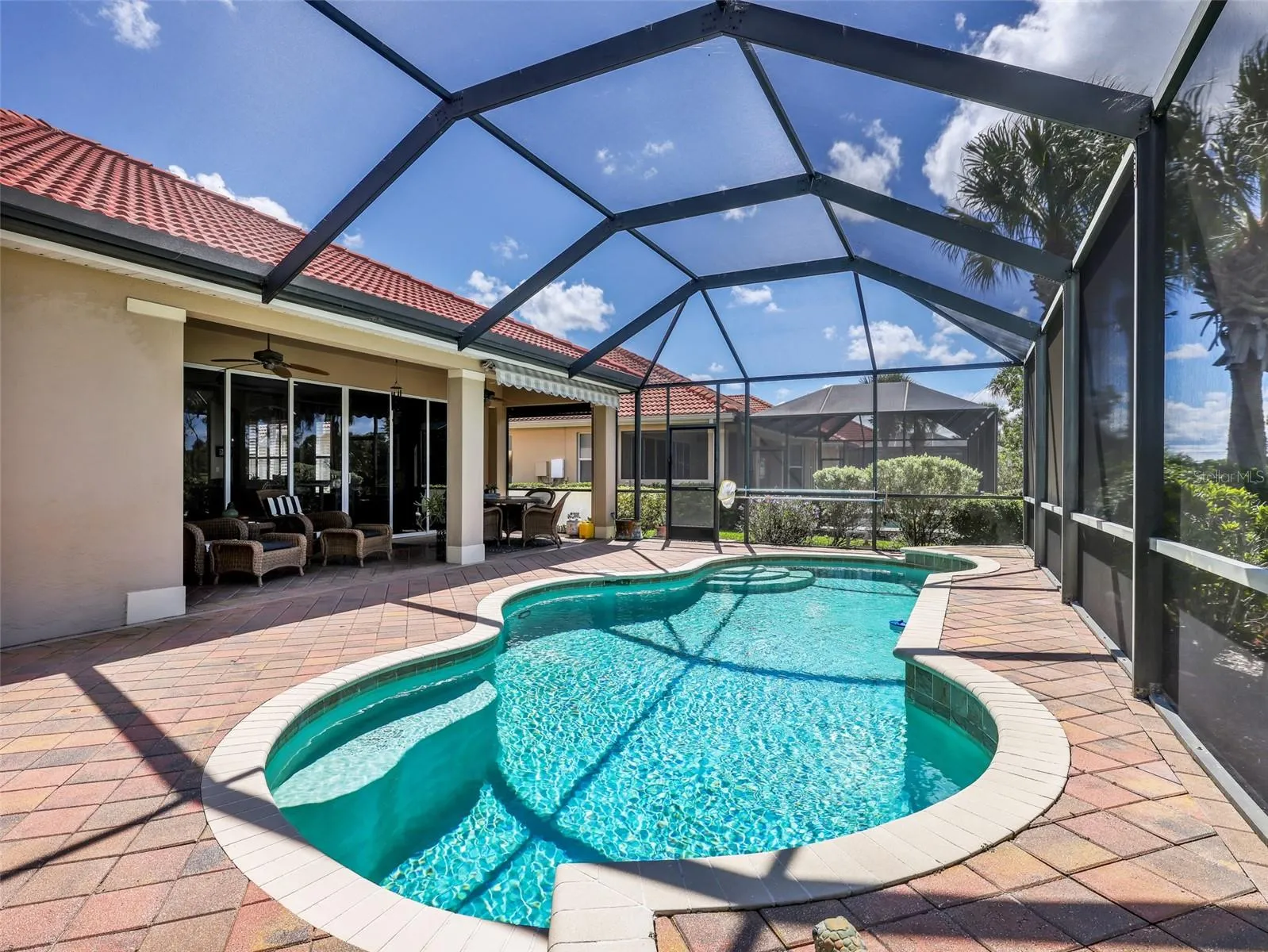 Spacious pool deck with plenty of room to lounge and entertain.