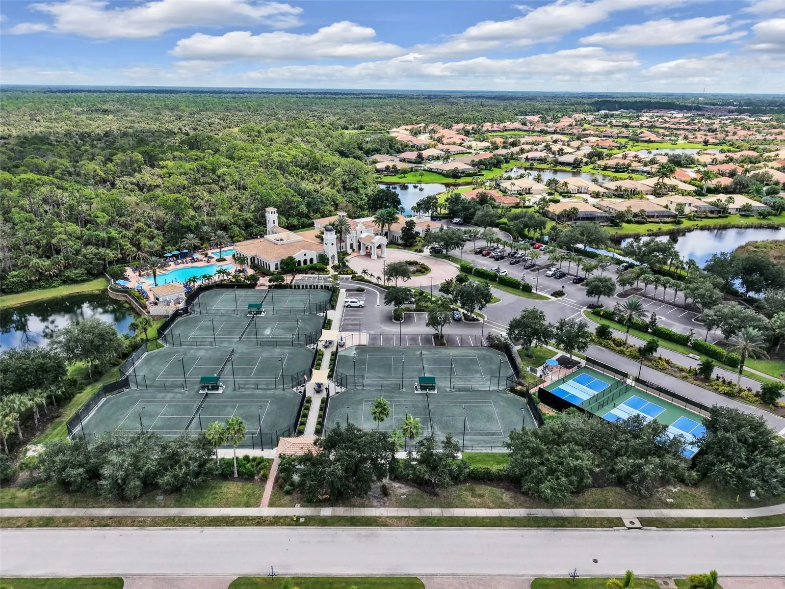 Dedicated tennis and pickleball courts for year-round play.