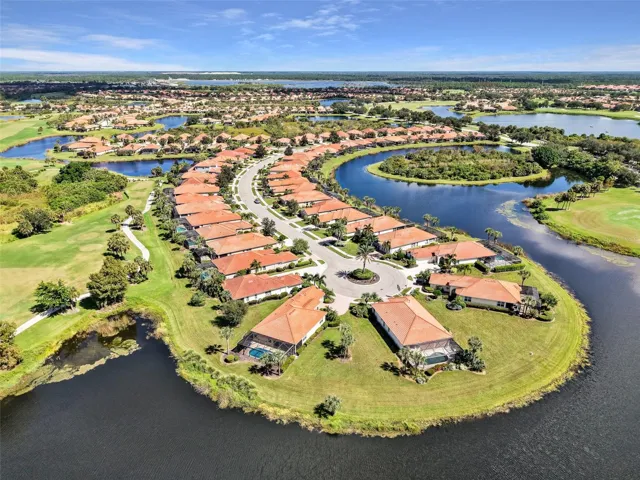 Aerial view showcasing the pool and golf course setting.