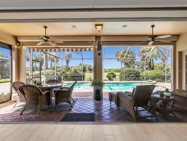 Covered lanai with plenty of room for outdoor dining and relaxing.