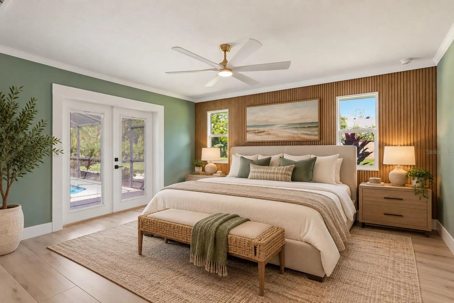 Primary Bedroom featuring beautiful wood accent wall