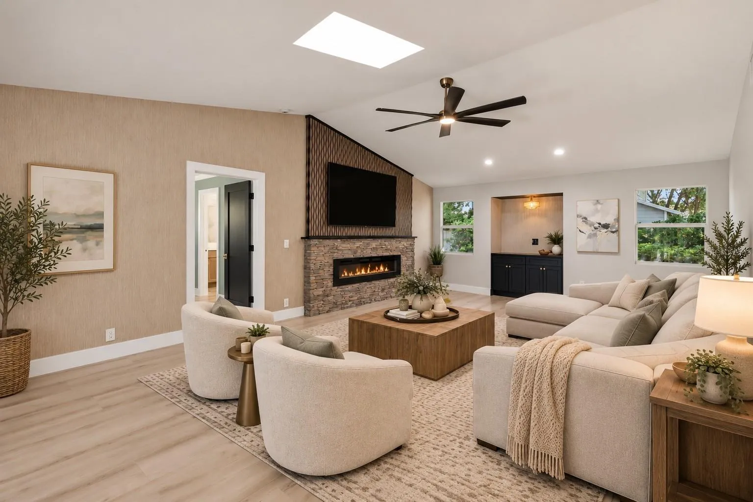 Family room featuring stunning accent wall and fireplace