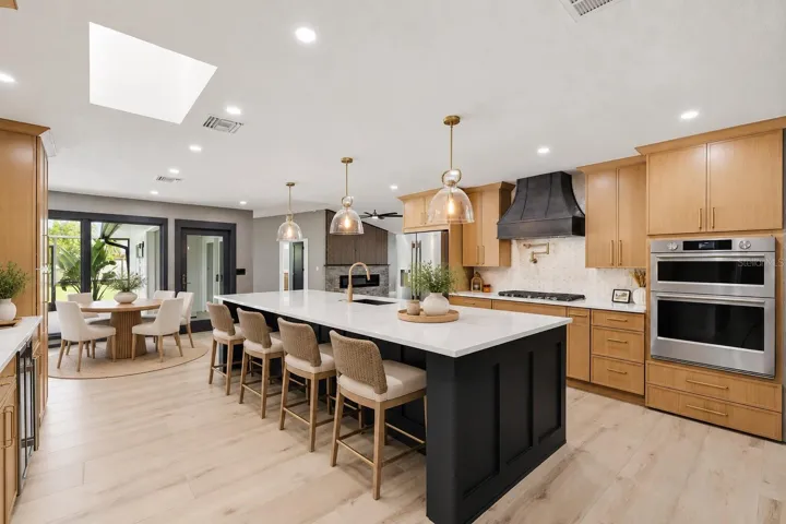Kitchen with huge island, bar seating and stunning finishes!