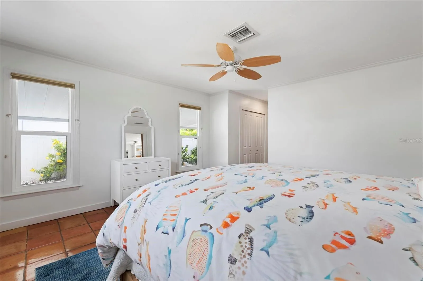 Primary bedroom with newly remodeled bathroom.