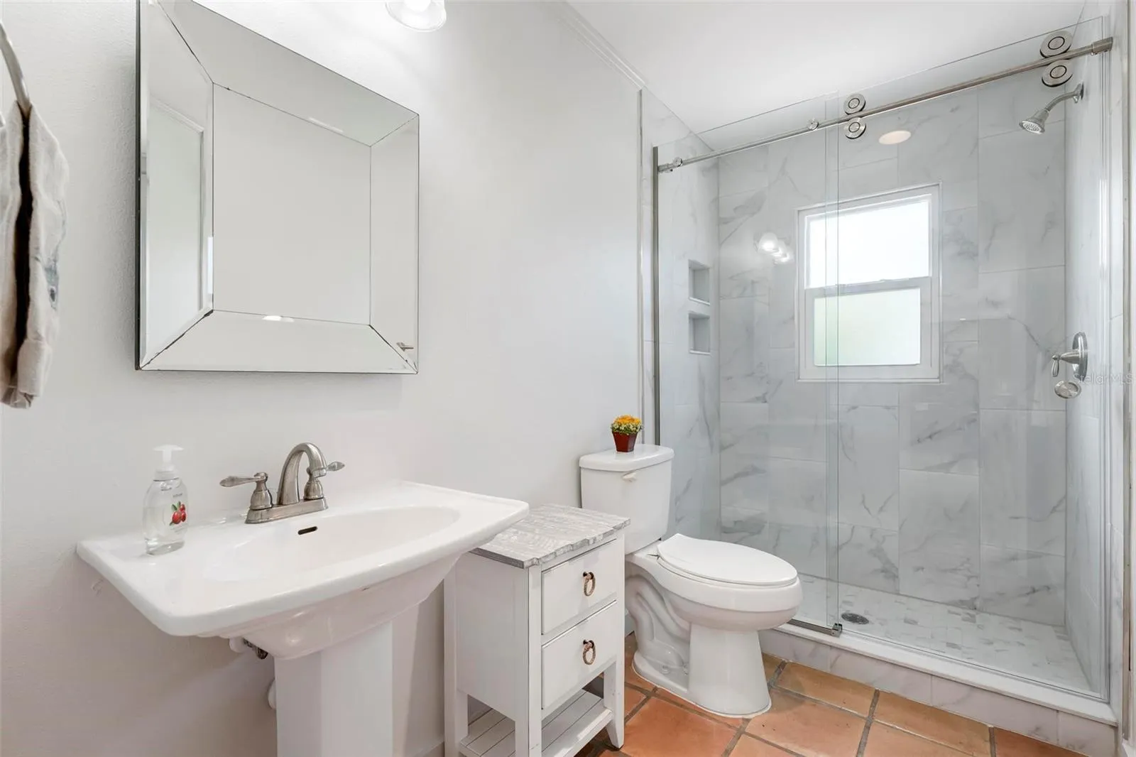 Third bathroom with walk in shower.