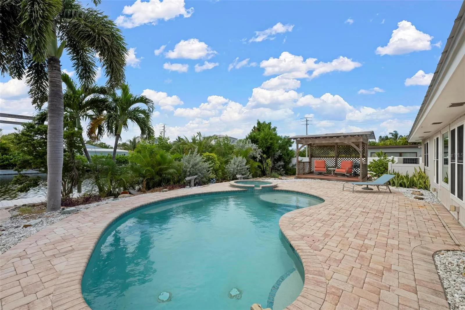 Heated saltwater pool, spa and pergola with southern exposure.