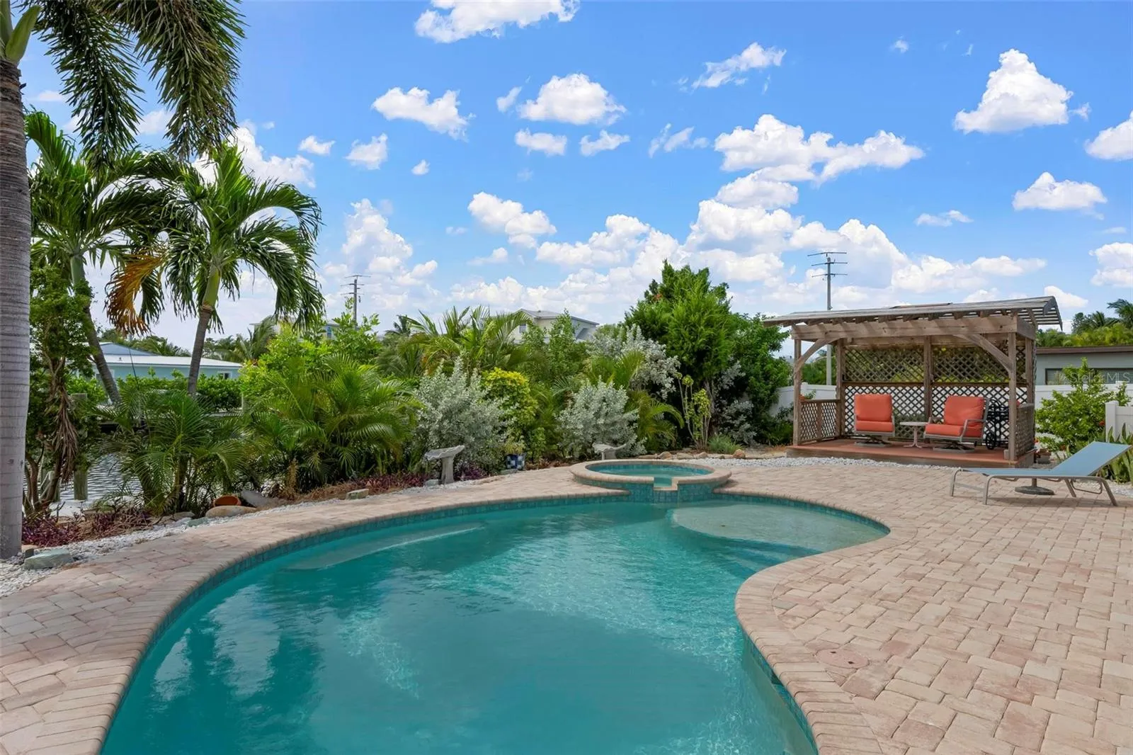 Heated saltwater pool, spa and pergola with southern exposure.