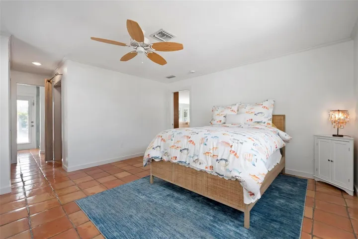 Primary bedroom with newly remodeled bathroom.