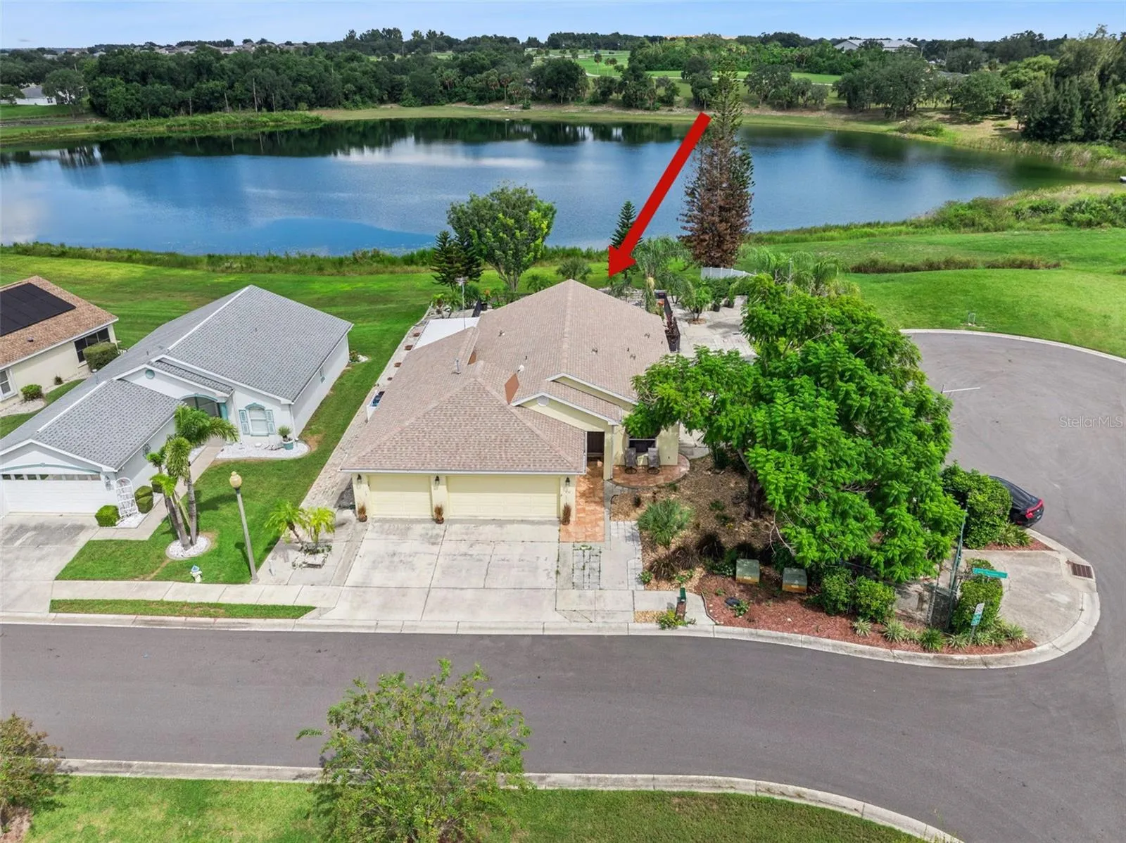 Experience the beauty of lakefront living in this wonderful 3-bedroom, 2-bath home with a den
