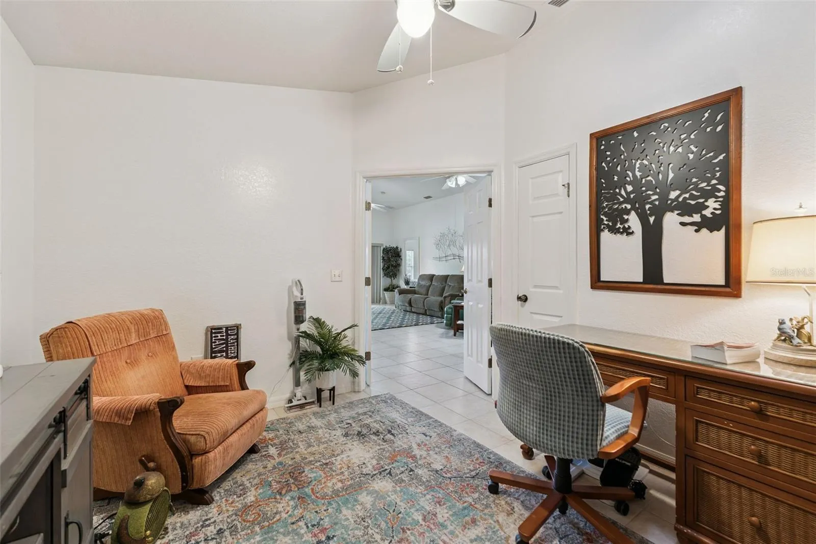 Cozy Den offers additional living space and features a solar skylight that fills the room with natural light