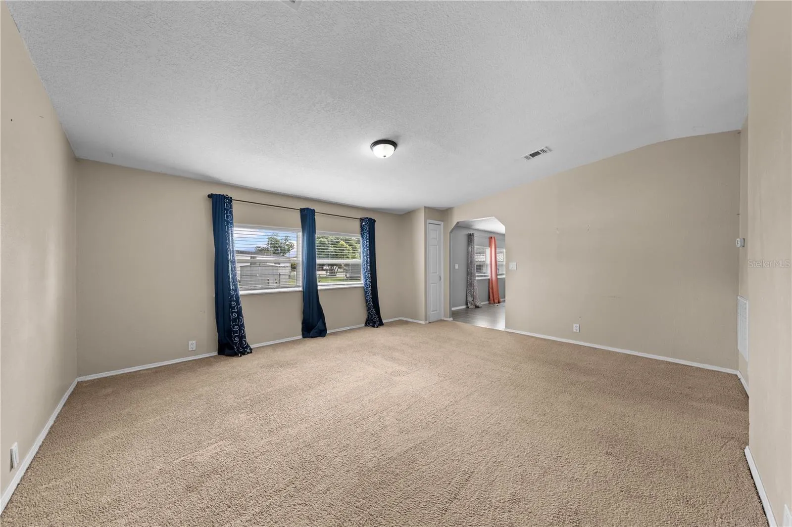 Family room facing front door and living room