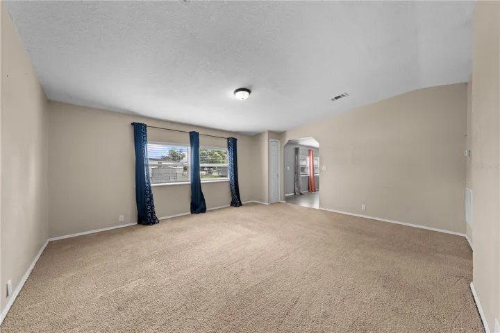 Family room facing front door and living room