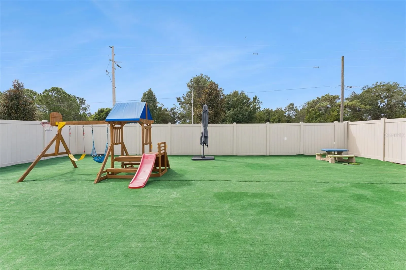 Turf fenced-in backyard