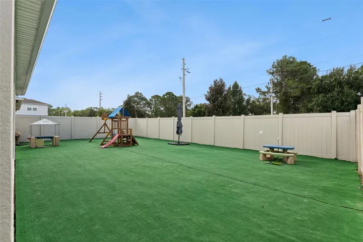 Turf fenced-in backyard