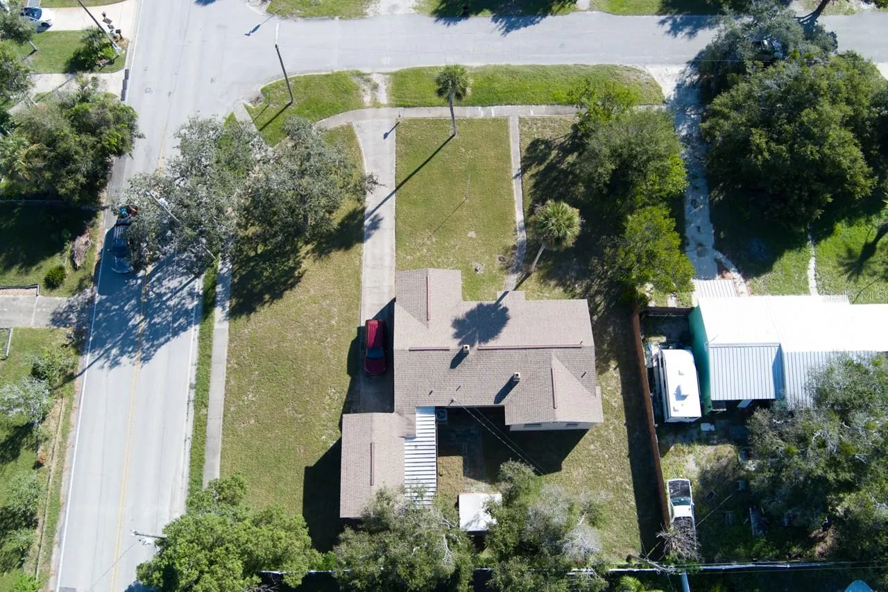 Aerial view of roof and property