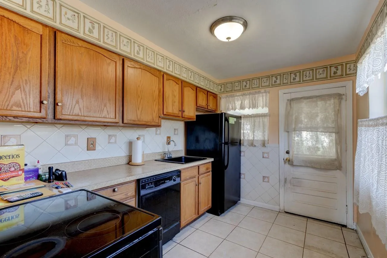 Kitchen with separate entry near garage