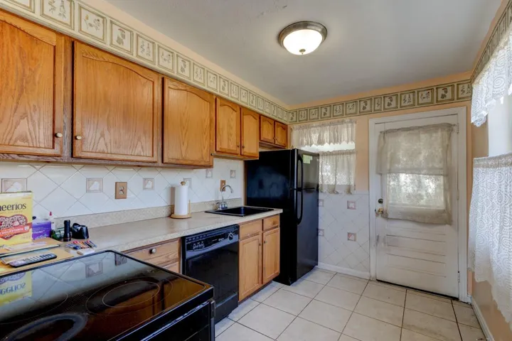 Kitchen with separate entry near garage