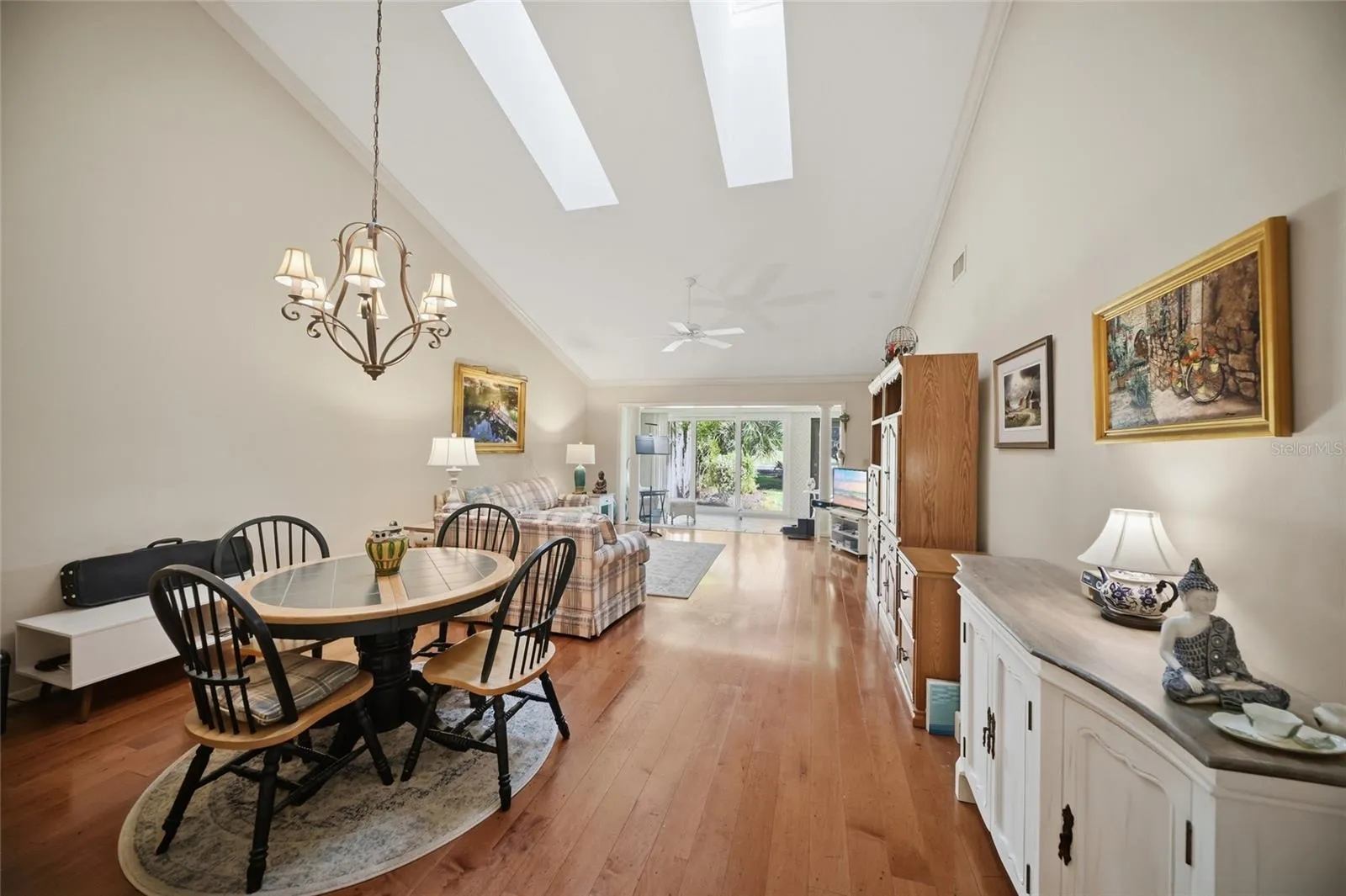 Open dining - Living room area with skylights