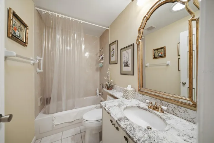 Guest bathroom with full tub